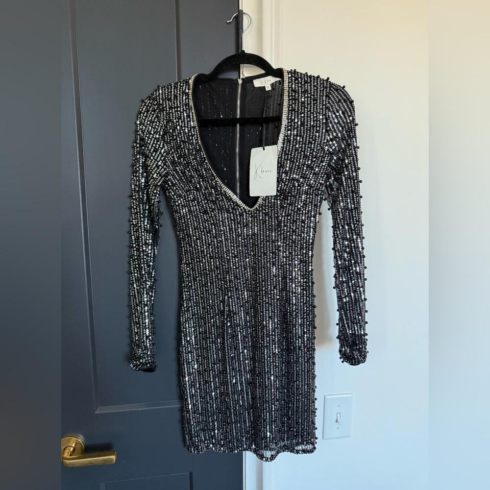 NWT Klesis beaded low V neck cocktail dress. Black. Size Small.